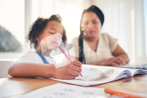 Image of Homework, education and mother helping child by the dining room table in the family home. Elearning, online school and mom watching her girl kid color in a book for development at a modern house.