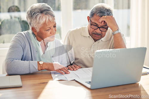 Image of Senior couple, laptop and documents in financial crisis, schedule payment or checking bills at home. Mature man and woman on computer, paperwork or expenses in finance plan, debt or mistake in house