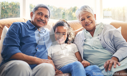 Image of Grandparents, portrait and happy child on sofa in home living room, bonding and having fun together. Smile, grandma and grandfather with kid in lounge to relax with love, care and family connection