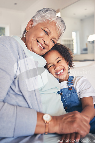 Image of Portrait, hug and grandma with girl, smile and bonding with weekend break, love and care in a living room. Face, granny or kid with happiness, home and support in a lounge, family or loving together