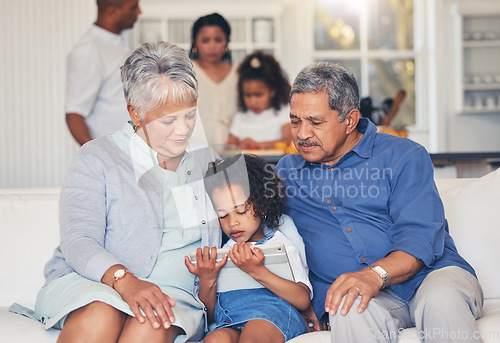 Image of Relax, child or grandparents with tablet for elearning or studying for education or remote learning at home. Family, grandfather or grandmother with girl reading ebook or streaming videos or movies