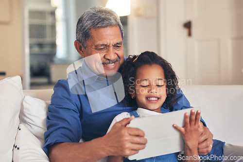 Image of Old man, kid and tablet, cartoon and relax together on sofa, bonding with online streaming and connection. Love, care and grandfather with child and technology, subscription and watch video or film