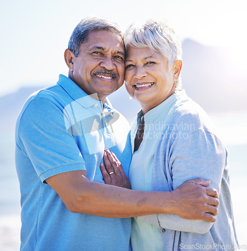 Image of Love, portrait and senior couple at beach, hug or travel, bond and happy in nature together. Retirement, freedom and face of old people embrace at sea, trust or care on traveling ocean trip in Mexico