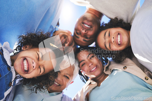 Image of Happy family, face and smile in bonding, support or unity below together on weekend or summer vacation. Low angle of parents, grandparents and children huddle in happiness for fun holiday getaway