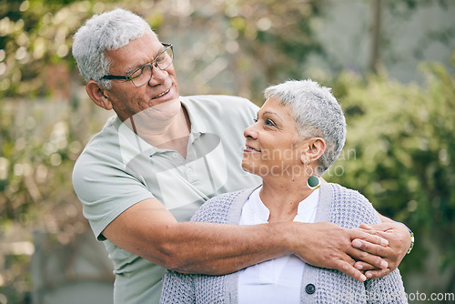 Image of Hug, love and senior couple in a garden with care, trust and support, conversation and bond outdoor. Happy, marriage and elderly man with old woman in backyard embracing retirement, relax and smile