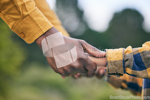 Image of Park, holding hands and nature child, parent or family quality time, kindness and care on outdoor adventure, wellness or love. Support, relationship and kid freedom, connect or closeup people bonding