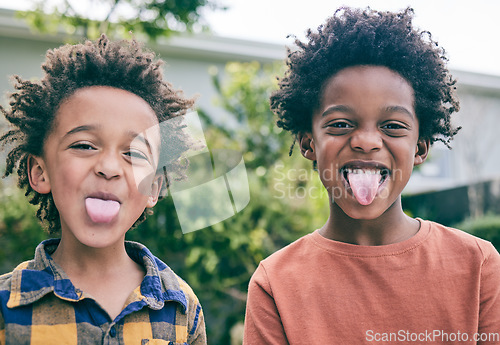 Image of Children, portrait and brothers with tongue out in a backyard for fun, playing and sibling bonding outdoor. Family, love and kids with funny face, emoji and silly together in a garden on the weekend