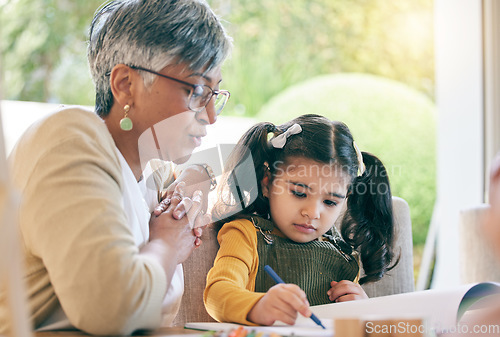 Image of Teaching, grandma or girl learning drawing in book for creative skills or growth development. Senior, support or mature grandmother helping an artistic child to color in a school project or homework
