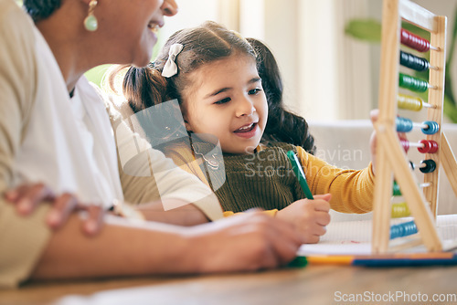 Image of Home, education and girl child with grandmother, abacus and smile for counting, project and kindergarten lesson. Learning, math and kid with grandma in living room with love, support and study help