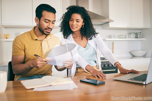 Image of Couple, insurance paperwork and budget planning with laptop, bills and finance with taxes and mortgage. Financial documents, payment and loan with policy, audit and review with asset management