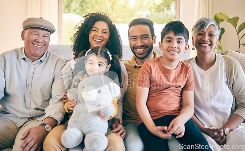 Image of Portrait, smile and big family in home living room, bonding and having fun together. Happy, children and grandparents, mother and father in lounge on sofa with care, love and interracial connection