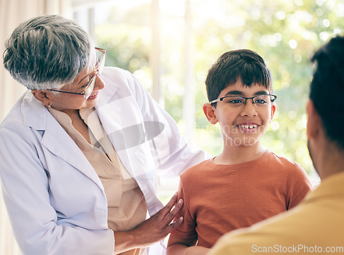 Image of Glasses, optometry and a boy at the clinic for prescription frame lenses to improve vision or eyesight. Medical, kids and a male child in an optician office for an eye exam or optical assessment