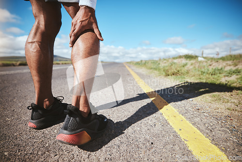 Image of Legs injury, marathon runner or person massage nerve problem, calf muscle ache or fatigue burnout from exercise. Joint pain, anatomy risk or closeup athlete hurt from running accident on asphalt road