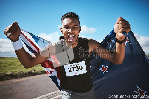 Image of Portrait, fitness and flag of New Zealand with a man runner on a road for motivation or success at a race. Winner, health or celebration with an athlete cheering during cardio training or competition