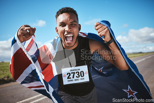 Image of Portrait, training and flag of New Zealand with a man runner on a street in nature for motivation or celebration. Sports, winner and success with an athlete cheering for cardio or endurance training