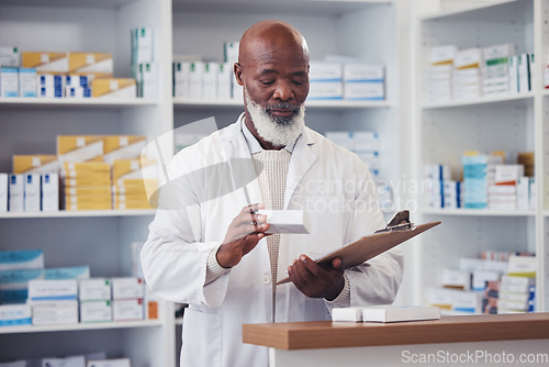 Image of Pharmacy medicine, clipboard and mature black man reading product description, package info or checklist for clinic inventory. List, medical pills box and pharmacist check pharmaceutical supplements
