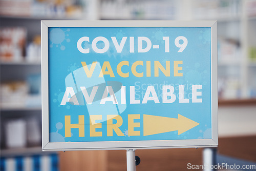 Image of Covid 19 vaccine sign, arrow pointing or pharmacy service announcement for protection, health safety or medical healthcare. Hospital clinic, billboard or poster notification for corona virus security