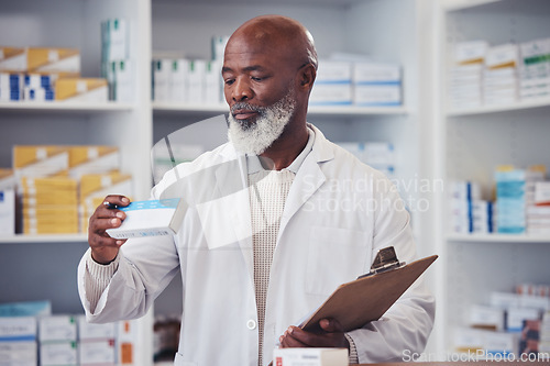 Image of Pharmacy, medicine or mature black man reading product description, package information or clinic inventory of hospital stock. Box, medical pills or African pharmacist check pharmaceutical supplement