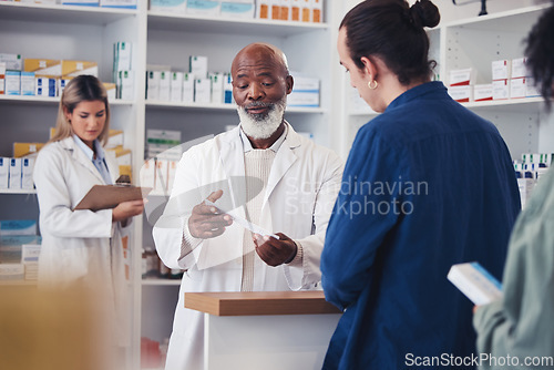 Image of Pharmacy, customer or mature pharmacist explain prescription paper, medicine information or healthcare receipt. Store clinic, hospital conversation or black man consulting patient over medical choice