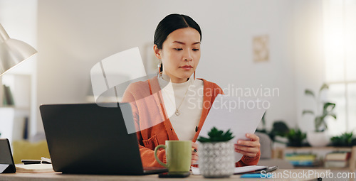 Image of Remote work, paperwork and Asian businesswoman working on laptop from home, house or apartment. Freelance, worker and professional employee review report and planning company strategy on documents