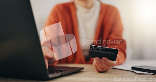 Image of Laptop, credit card and online shopping with a woman customer searching for a retail product or making payment. Finance, accounting or ecommerce with a female consumer doing an internet search