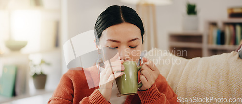 Image of Thinking, coffee and Asian woman on couch, relax and decision with inspiration, decision and calm in living room. Japan, female and lady with tea, motivation and ideas in lounge, peace and gratitude