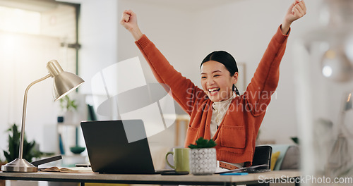 Image of Asian woman, laptop and celebration fist for company success, creativity goals and happiness in office. Digital marketing achievement, happy or excited employee celebrate for corporate target winner.