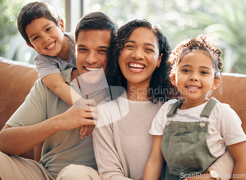 Image of Happy family, portrait and bonding on holiday, weekend or summer break in relax on living room sofa at home. Mother, father and children smile in happiness, love or care for day off at the house