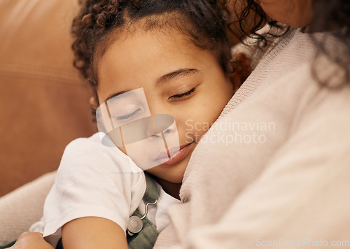 Image of Sleeping, love and face of a girl with her mother closeup in the living room of their home together for support. Family, hug and daughter in the arms of a parent on a sofa for trust, care or security