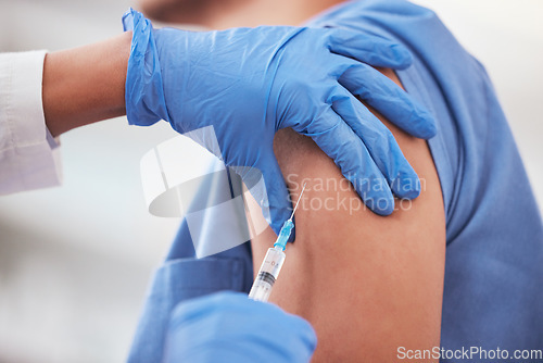 Image of Covid vaccine, needle and arm of patient with doctor at hospital for immunization treatment closeup. Nurse, hands and vaccination, shot or injection for person at clinic for compliance or prevention