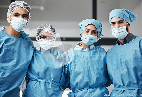 Image of Support, portrait and doctors with face mask for surgery, healthcare and work in theater. Together, hospital and group of surgeons with a hug for medical collaboration, teamwork and cardiology