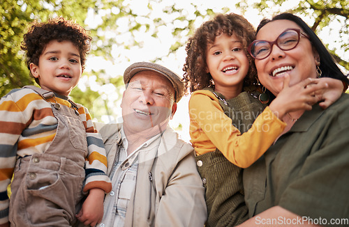 Image of Grandparents, children and portrait with a smile in park, garden or happy family relax together outdoor in backyard. Kids, hug grandmother and grandfather in nature on holiday or vacation with love