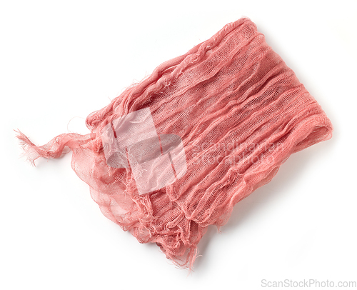 Image of pink folded crumpled cotton napkin