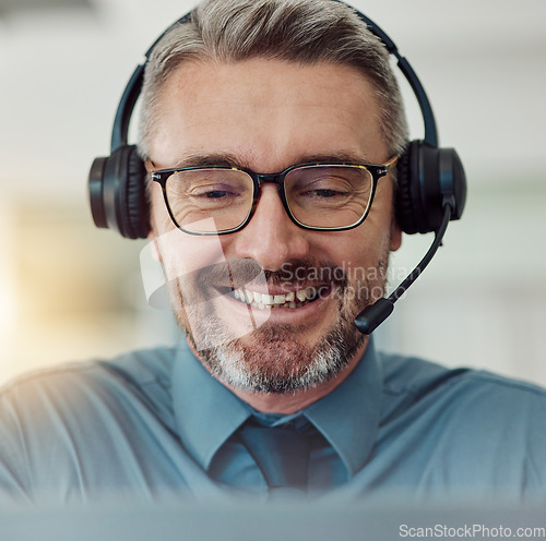 Image of Senior, happy man and face in call center with headphones in customer service, support or telemarketing at office. Mature businessman, consultant or agent smile in online advice, help or contact us