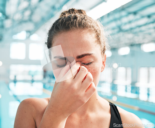 Image of Stress, headache or face of woman swimmer in fitness, exercise or workout with anxiety or fatigue. Tired, hand or sick athlete with migraine, sports injury or head pain frustrated by training problem