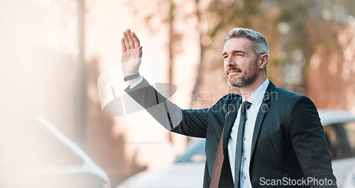 Image of Businessman, wave hand and travel outdoor on city street for professional commute and transport. Mature entrepreneur person with gesture to stop taxi, cab or ride hailing service on urban road