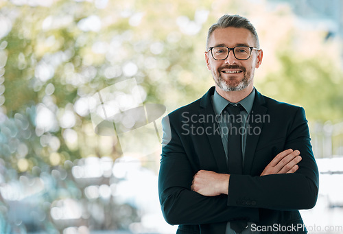 Image of Mature man, business and arms crossed outdoor for professional career and positive attitude. Portrait of happy entrepreneur or CEO person with pride, confidence or smile for corporate growth or space