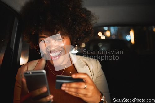 Image of Black woman, smartphone and credit card, travel and online shopping in car at night, happiness and payment. Smile, e commerce and internet banking, app and transportation with account and fintech