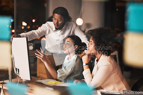 Image of Meeting, late night and business people at computer with problem solving, ideas and planning startup project together. Teamwork, overtime and office, team brainstorming at agency with man and women.