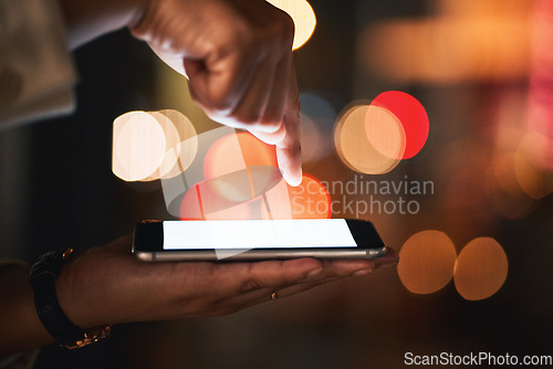 Image of Hand, phone and fingerprint access with a business person outdoor in the city closeup at night. Cybersecurity, password and biometrics with an employee holding a mobile for a social media dashboard