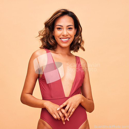 Image of Happy, fashion and swimsuit with portrait of woman in studio for summer, tropical and wellness. Beach, vacation and beauty with person on beige background for confident, holiday and self love mockup