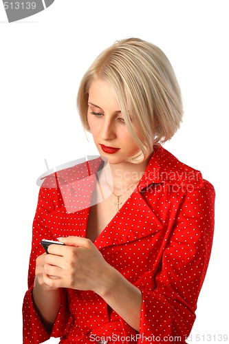Image of beautiful young woman reading message by phone