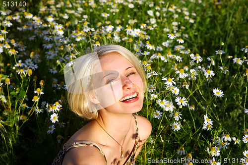 Image of Young Woman With daisy