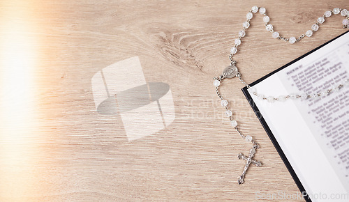 Image of Rosary, table or bible study for faith, studying religion and mindfulness with holy spiritual scripture. Christian literature, background or story for education or knowledge on God or Jesus Christ