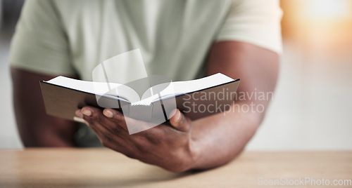 Image of Bible, reading and hands with book and religion study at home for worship and spiritual support. Faith, christian knowledge and person with gratitude, scripture education and god guidance in a house