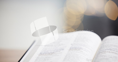 Image of Closeup, bible or book for faith, studying religion and mindfulness with holy spiritual scripture. Christian literature, background or learning story for education or knowkedge on God or Jesus Christ