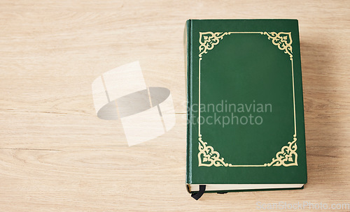 Image of Bible on table, mockup space and top view of knowledge, reading or study scripture in education. Holy book, desk and information for learning, gospel wisdom or spiritual worship in Christian religion