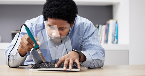 Image of Black man, soldering iron and fixing circuit board, computer hardware and maintenance with electronics upgrade. Tools, motherboard and CPU, engineering and electric repair with technology in office
