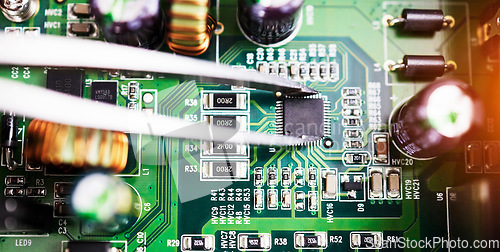 Image of Motherboard, microchip closeup and engineering tweezer with electric maintenance of circuit board. Developer, IT and dashboard for electrical hardware update and technician tools for technology