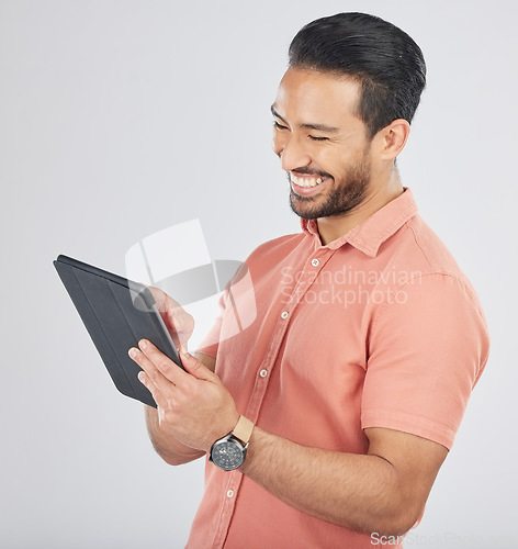 Image of Search, tablet and happy man entrepreneur with technology on the internet isolated in a studio white background. Online, planning and young person or employee working on connection or networking